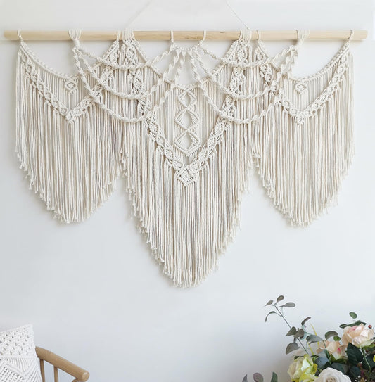 Large macramé wall hanging with intricate knots and fringe on wooden rod – Urban Nest